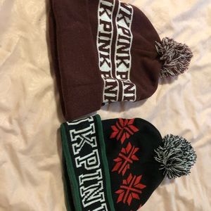 Two authentic pink fuzz ball hats !